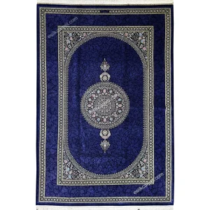 فرش دستباف طرح ترنج گل‌محو سلطنتی سرمه‌ای تمام ابریشم قم، نگینی کمیاب از اصالت ایرانی برای دکورهای فاخر، esilkcarpet.com