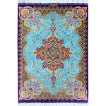 محبوب‌ترین فرش ابریشم ترنجی فیروزه‌ای لور بنفش سایز 62.5*90سانتیمتر